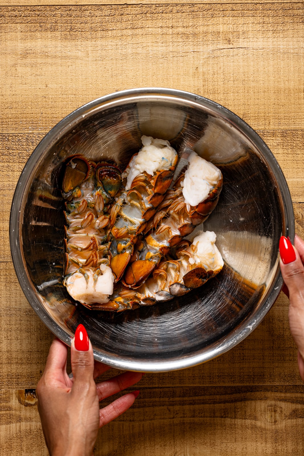 Lobster tails in a silver bowl.