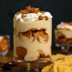 Up close shot of banana pudding in a trifle bowl.