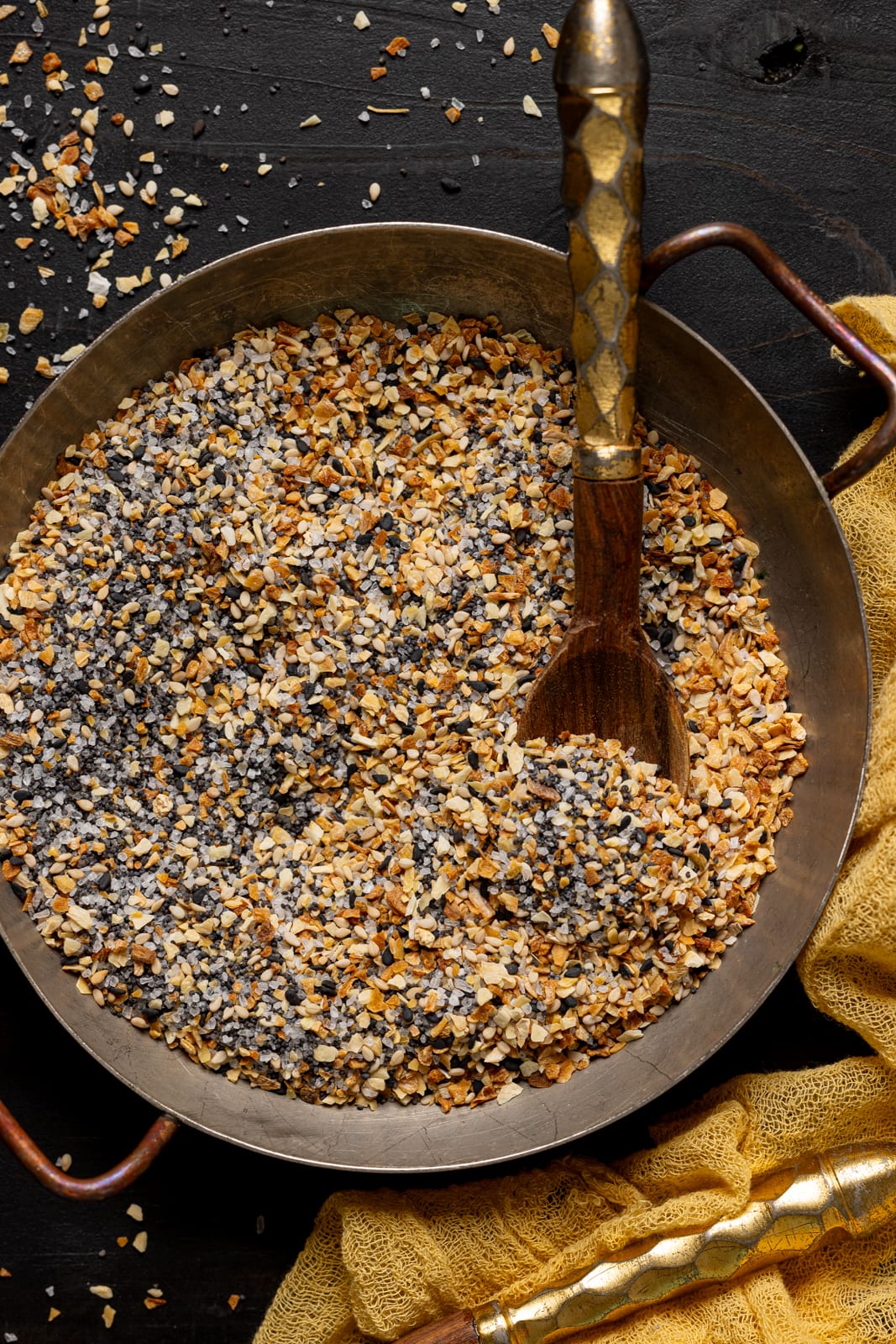 Up close shot of seasoning with a spoon.