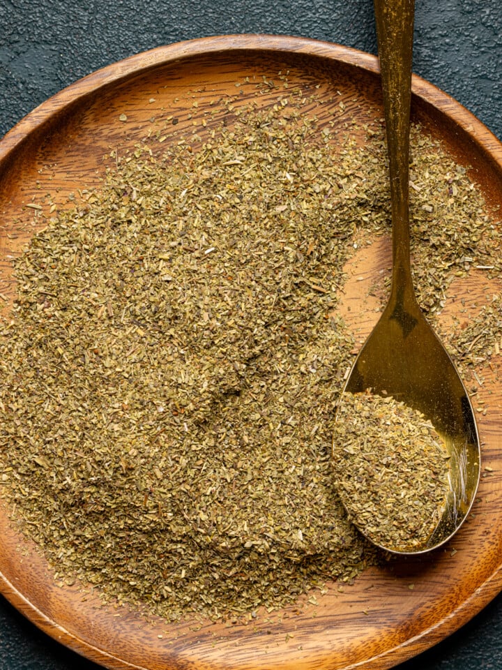 Seasoning on a plate with a spoon.