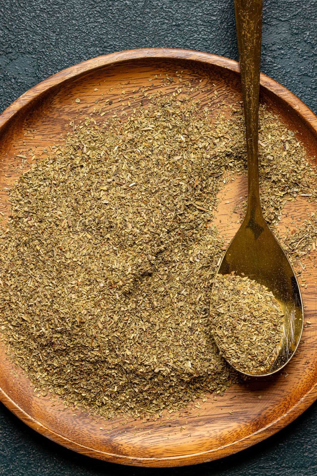 Seasoning on a plate with a spoon.