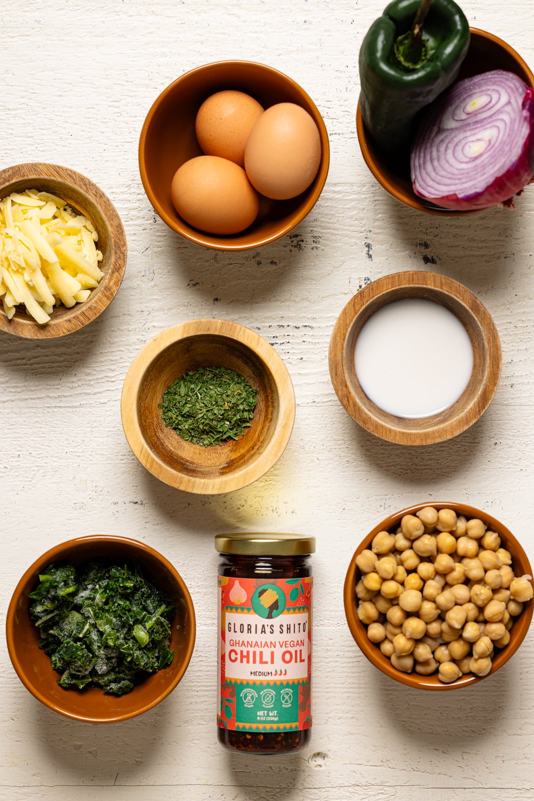 Ingredients on a white wood table.