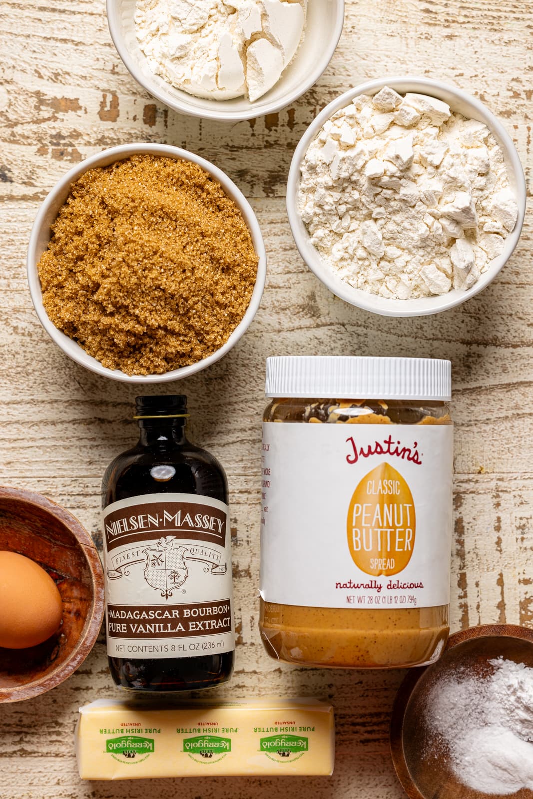 Ingredients on a white wood table.