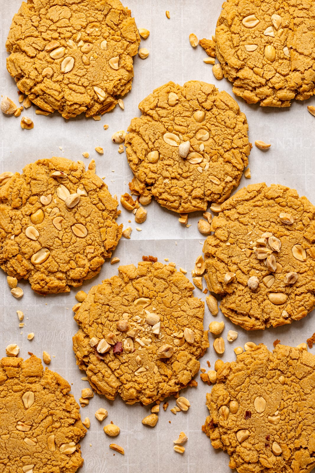 Cookies baked on a baking sheet with parchment paper.