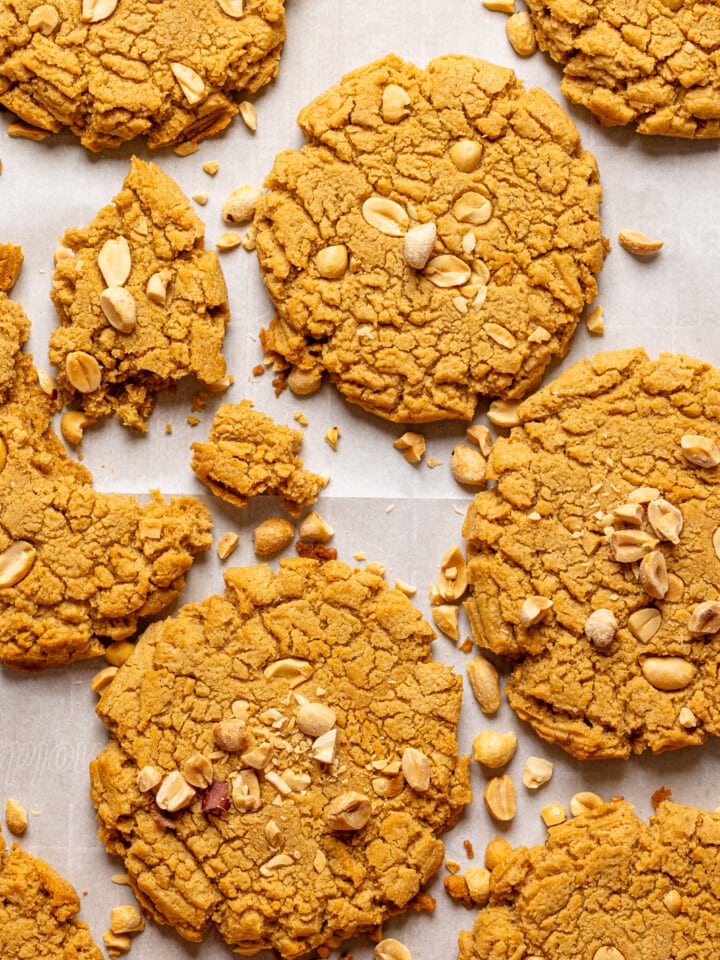 Up close shot of baked cookies on a baking sheet.