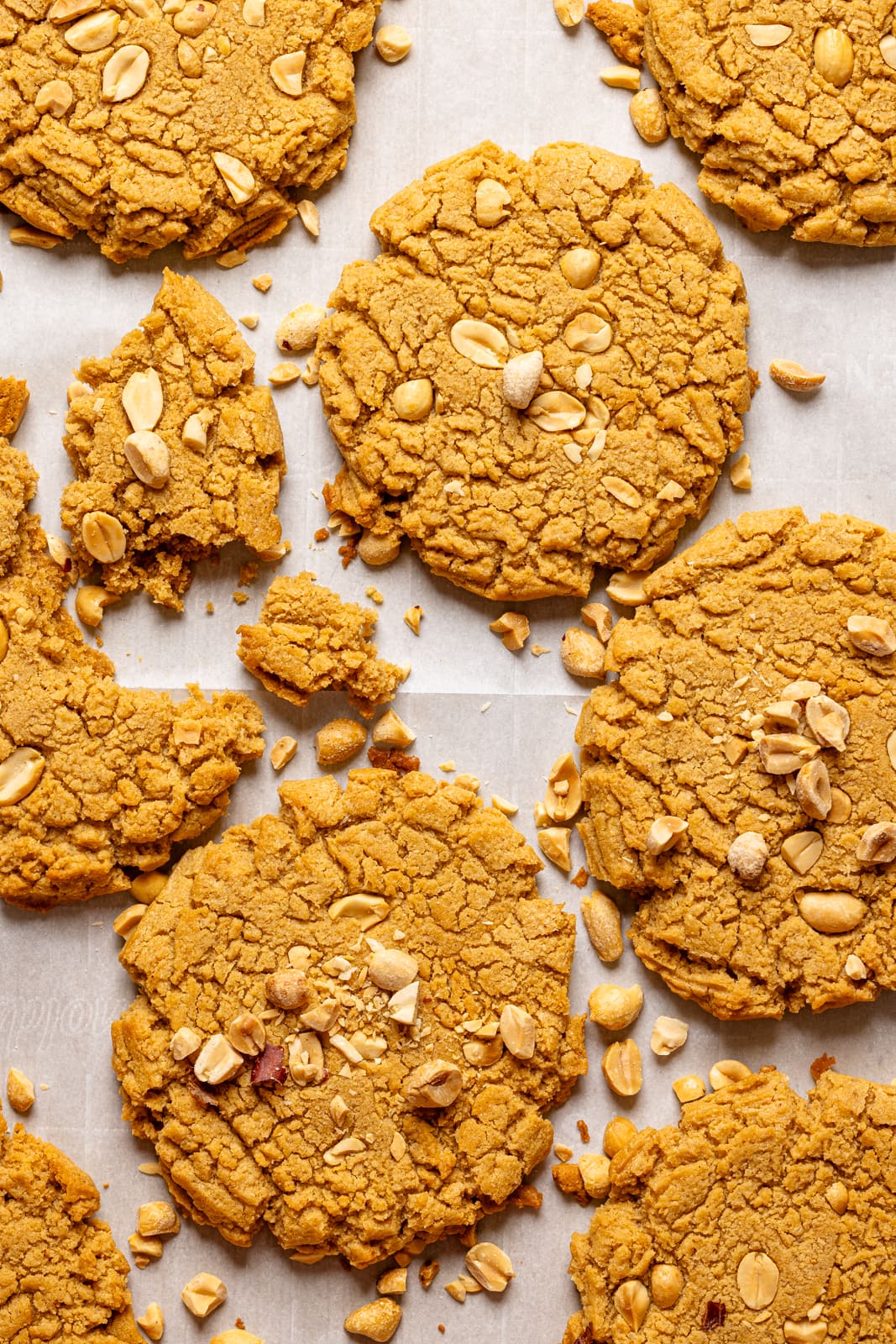 Up close shot of baked cookies on a baking sheet.
