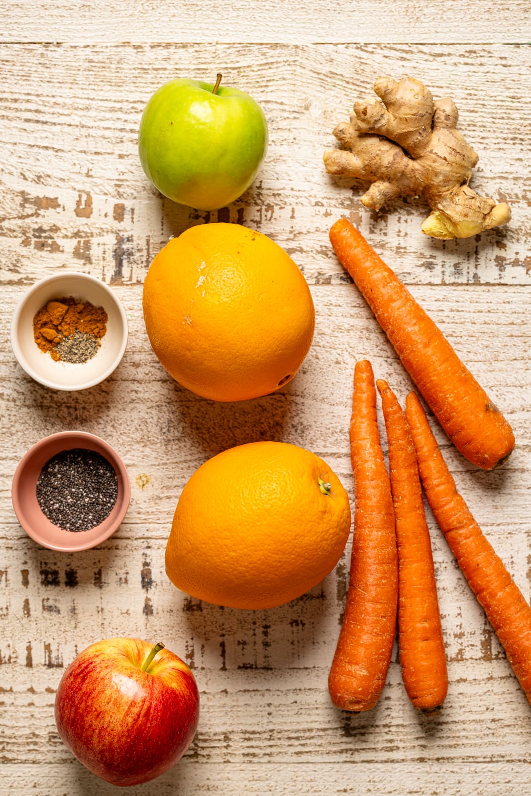 Ingredients on a white wood table.