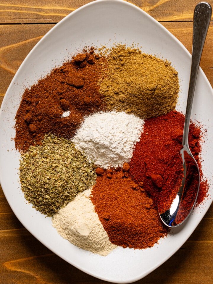 Seasoning on plate with a spoon.