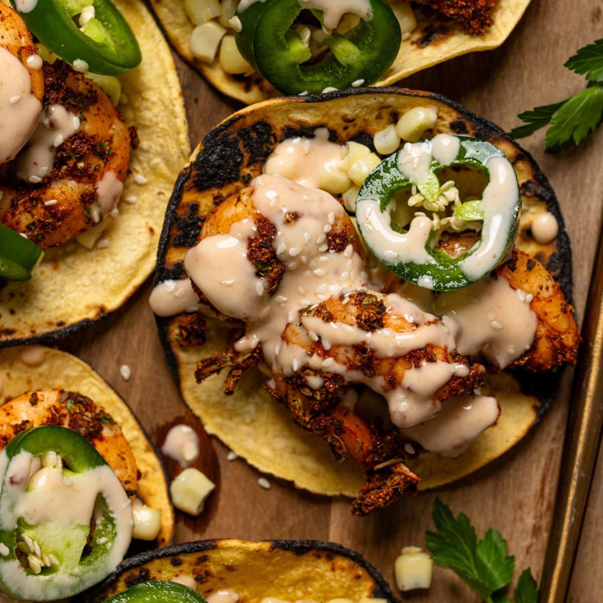 Up close shot of shrimp tacos with a spoon.