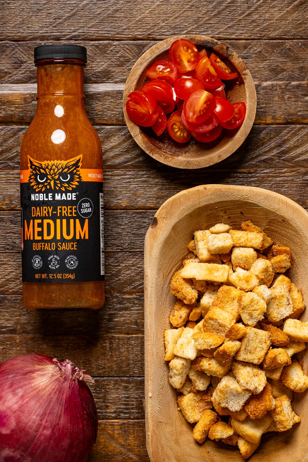 Ingredients on a brown wood table.