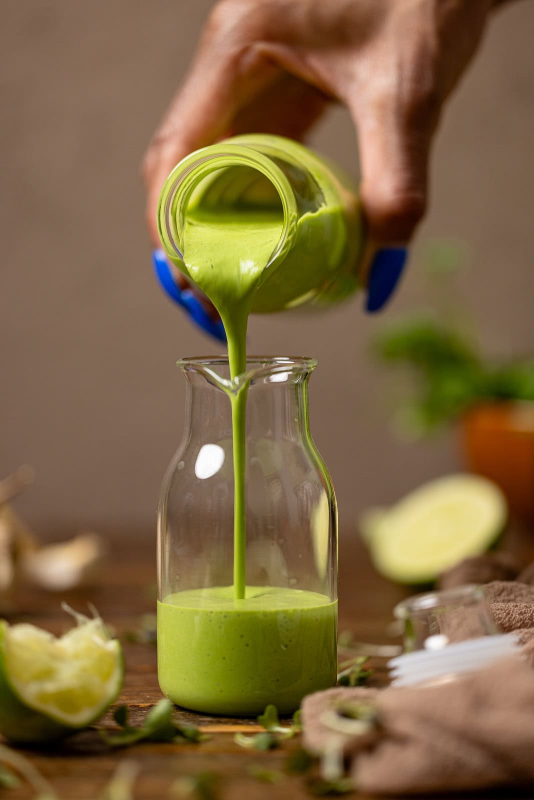 Pouring of dressing in a jar.