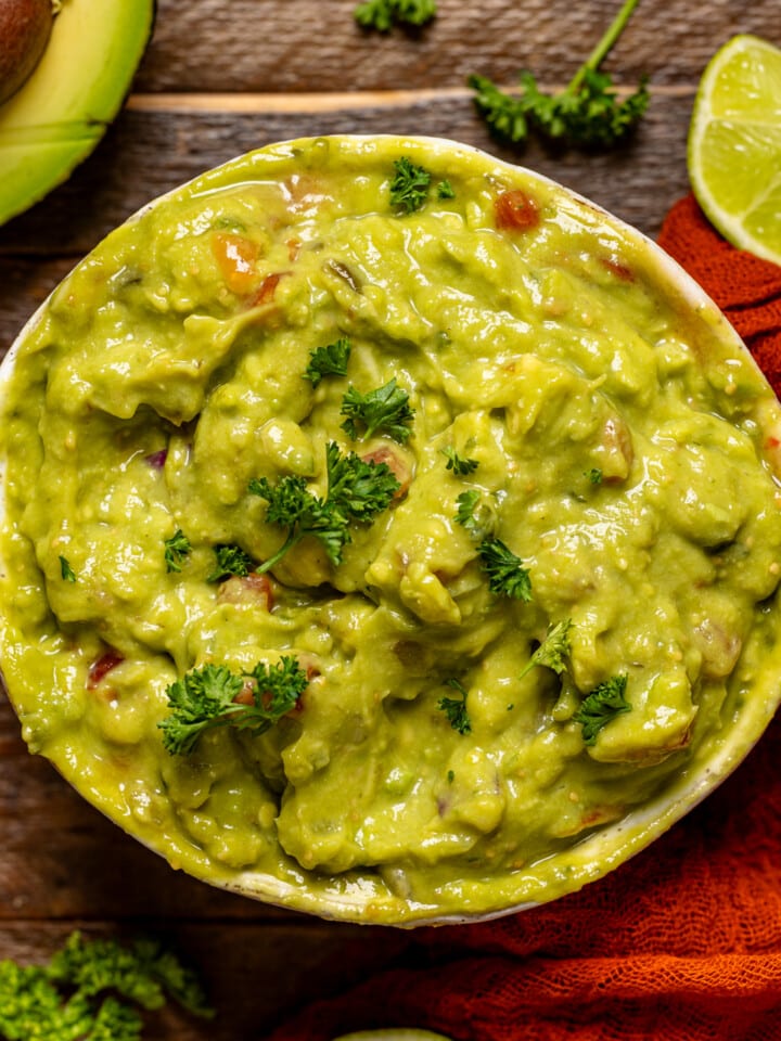 Up close shot of guacamole in a bowl.