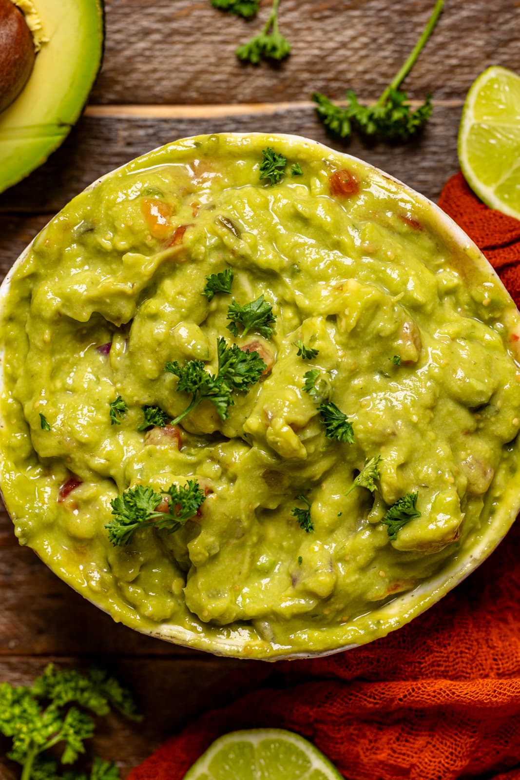 Up close shot of guacamole in a bowl.