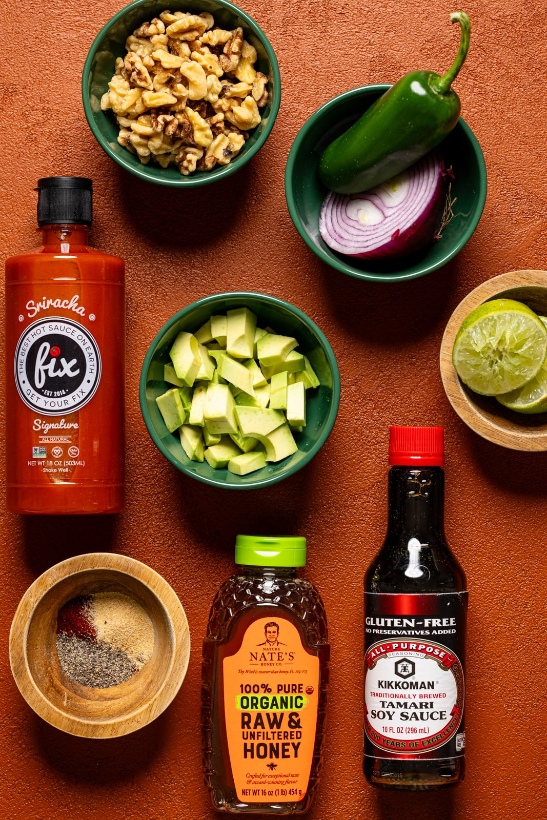 Ingredients on a burnt orange table.