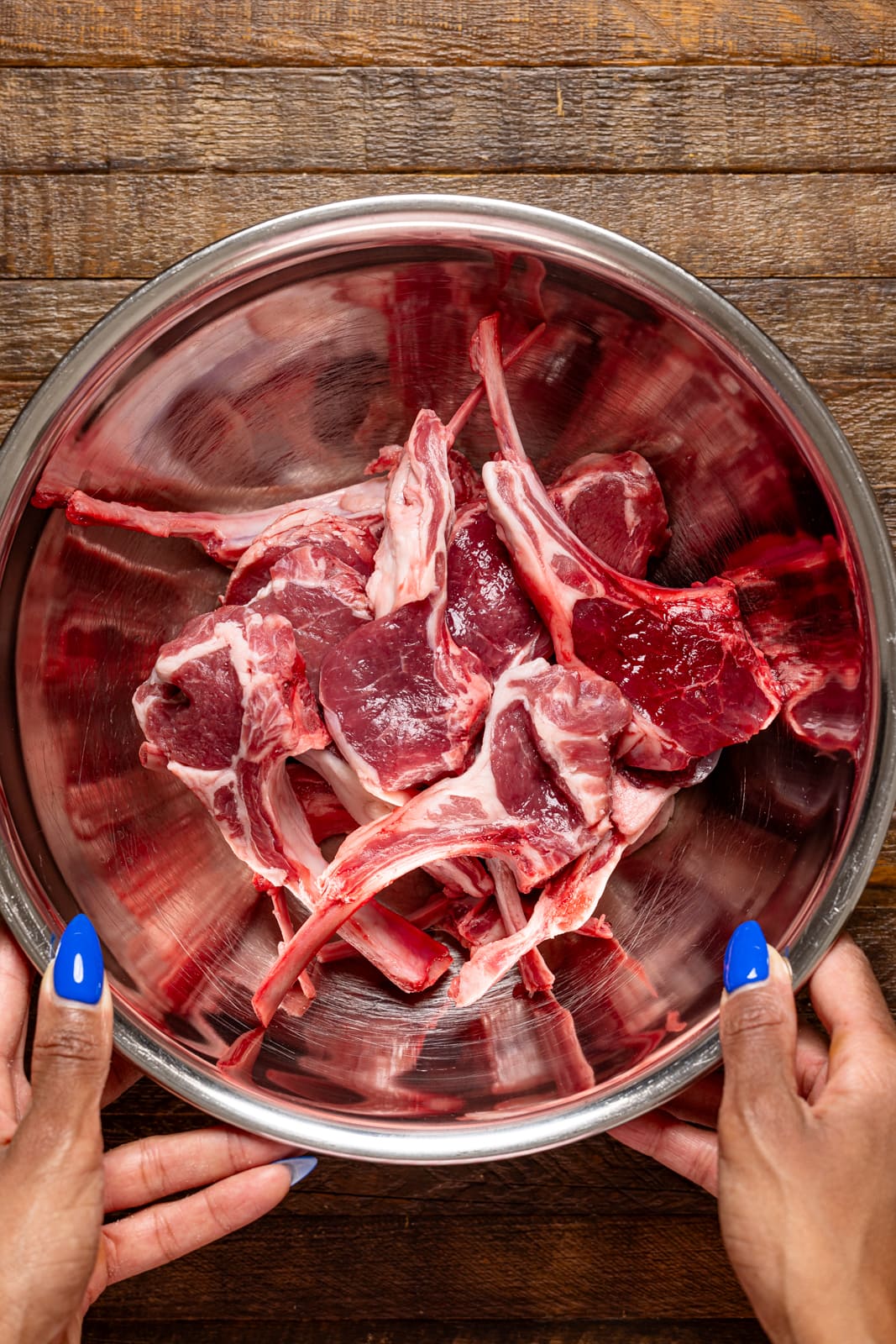 Lamb Chops in a silver bowl.