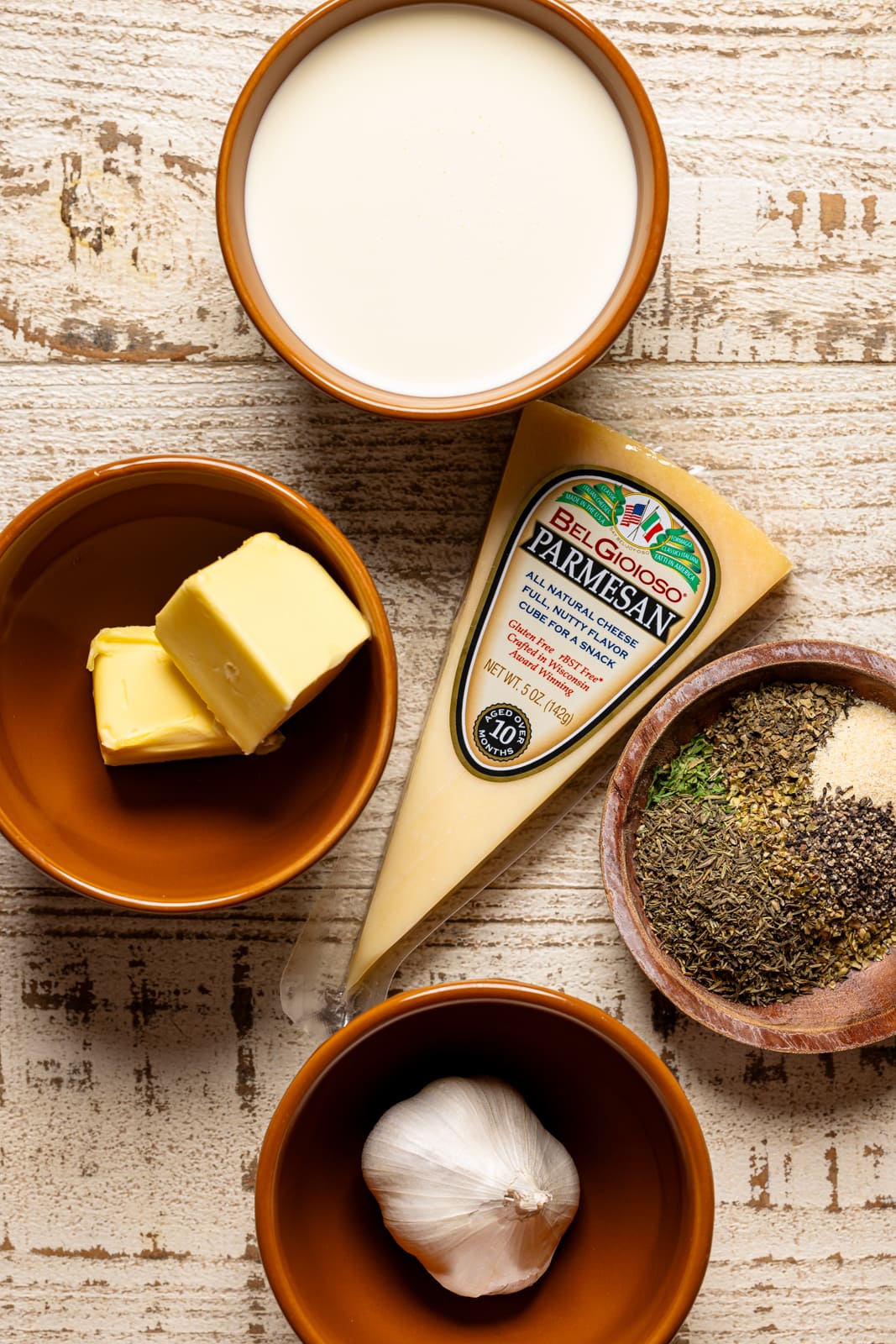 Ingredients on a white wood table.