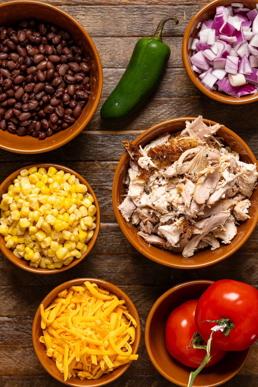 Ingredients on a brown wood table.