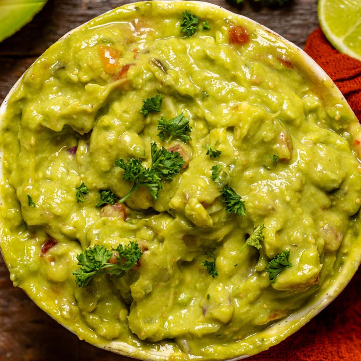 Up close shot of guacamole in a bowl.