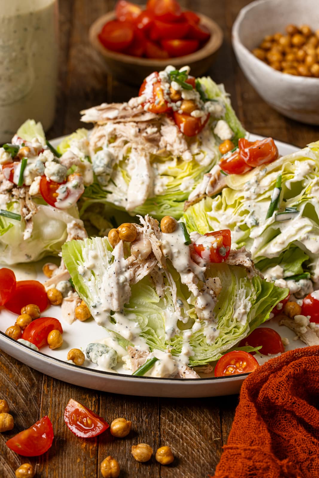 Front view shot of wedge salads on a plate.