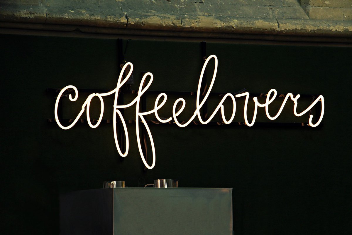 Neon sign that says Coffee Lovers.