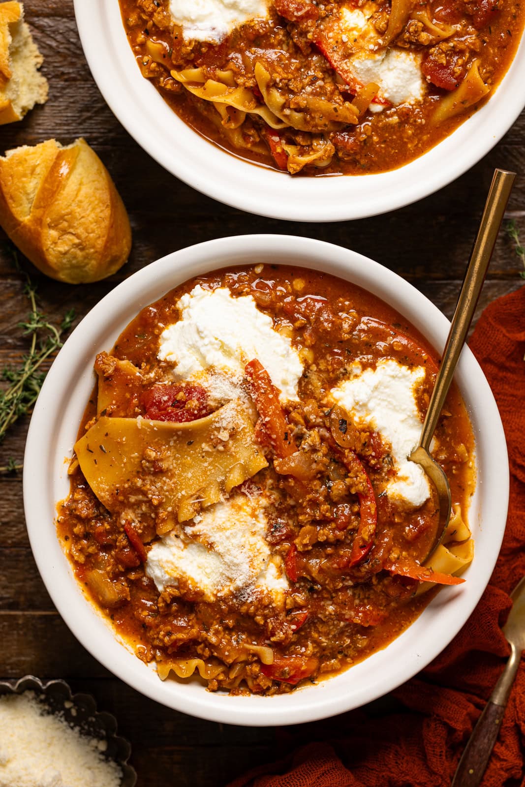 Bowl of lasagna soup with a spoon.