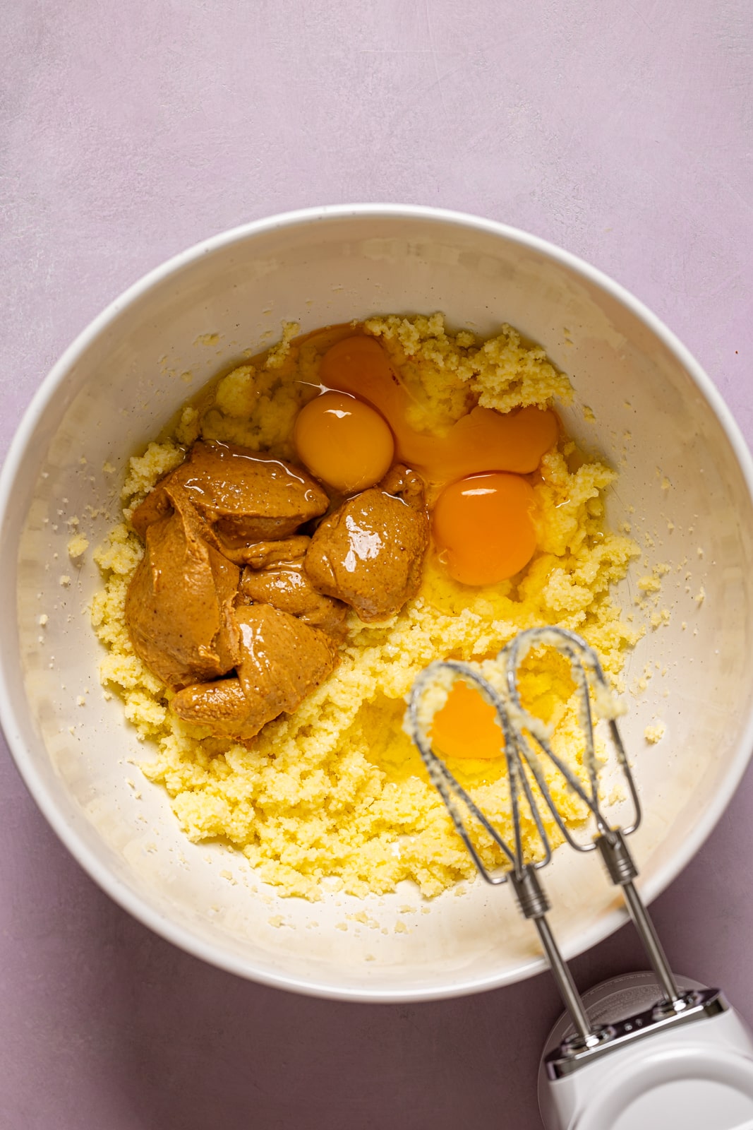 Bowl with ingredients being mixed. 