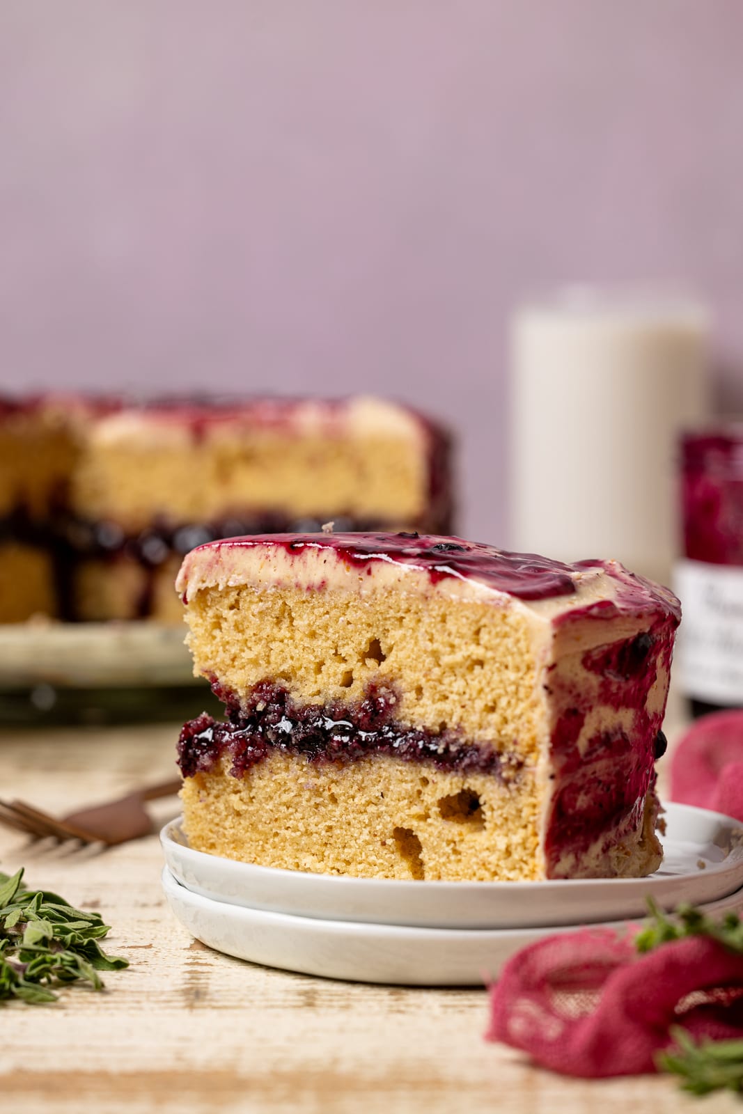 Up close shot of cake slice on white plates.