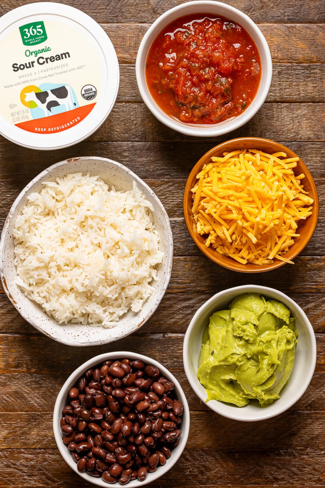 Ingredients on a brown wood table.