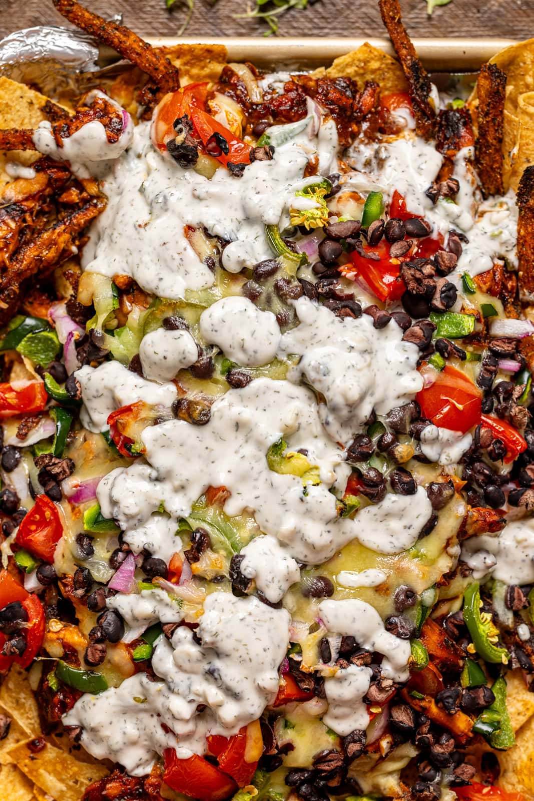 Up close shot of bbq chicken nachos.