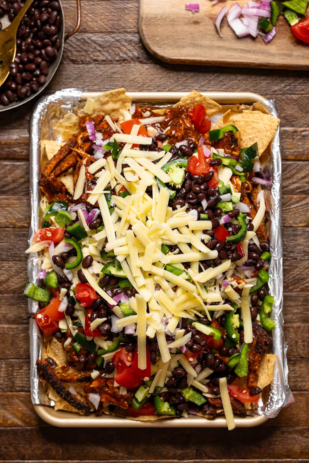 Ingredients layered on a baking sheet.