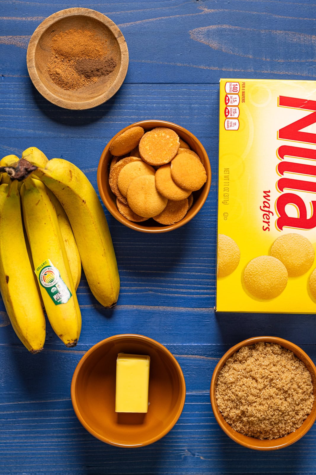 Ingredients on a blue wood table.