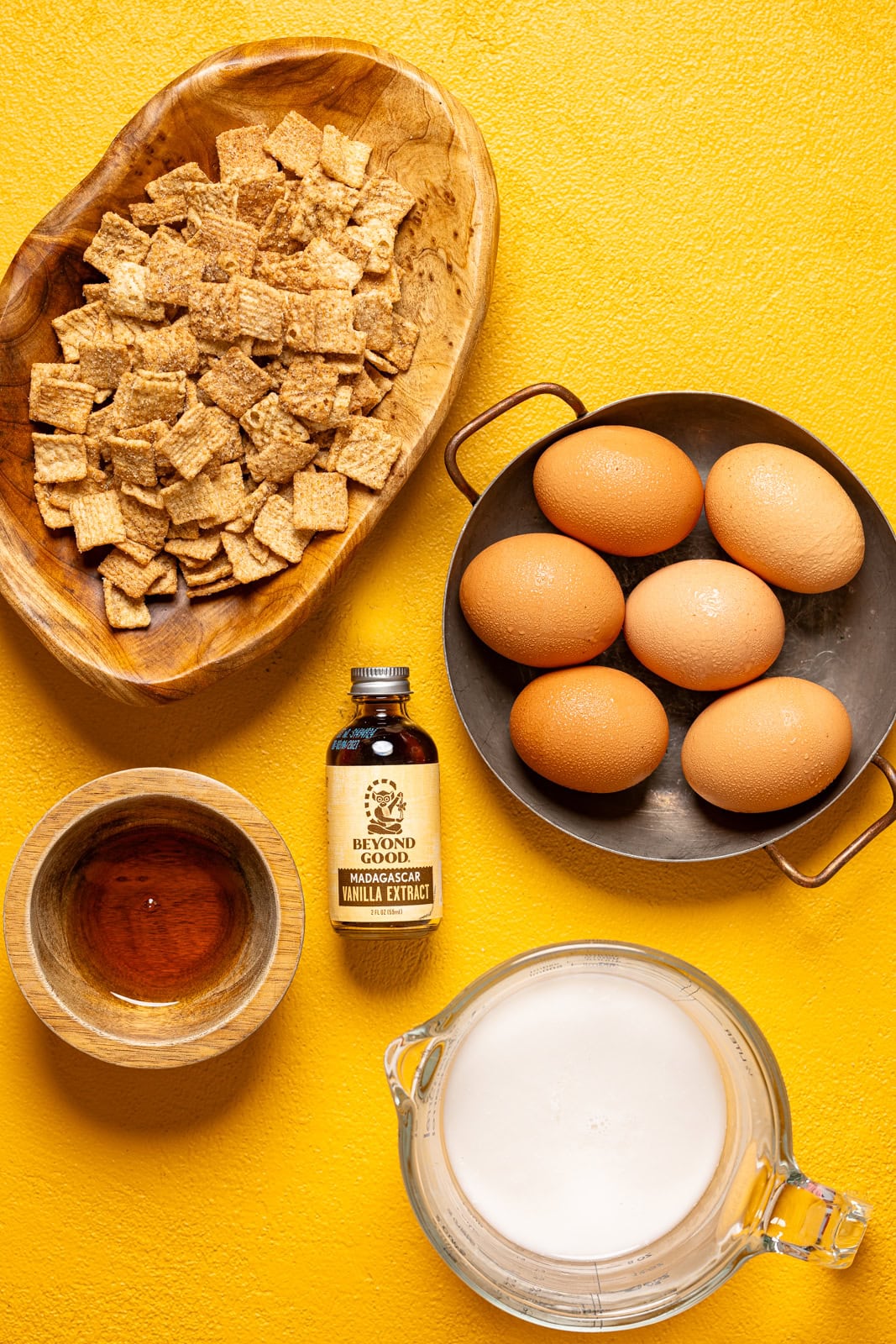 Ingredients on a yellow table.