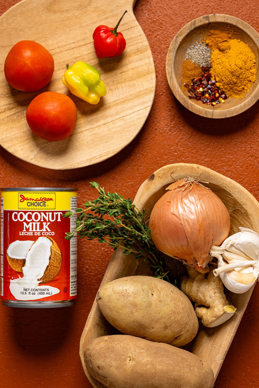 Ingredients on a burnt orange table.