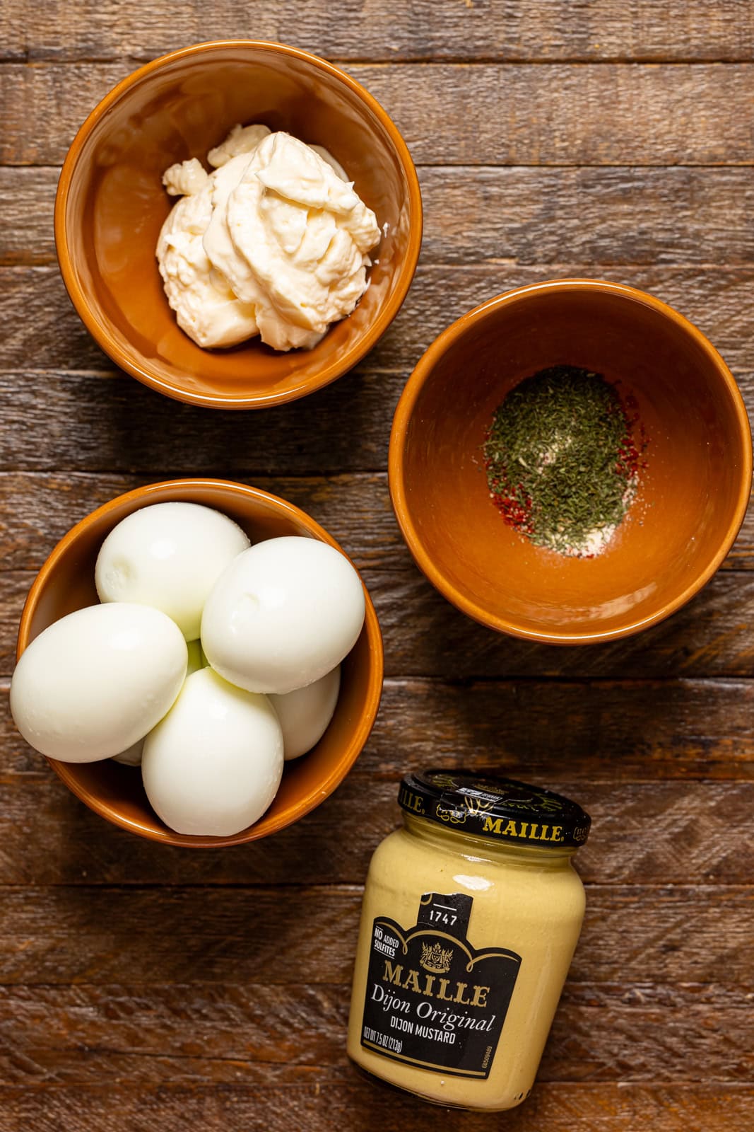 Ingredients on a brown wood table.