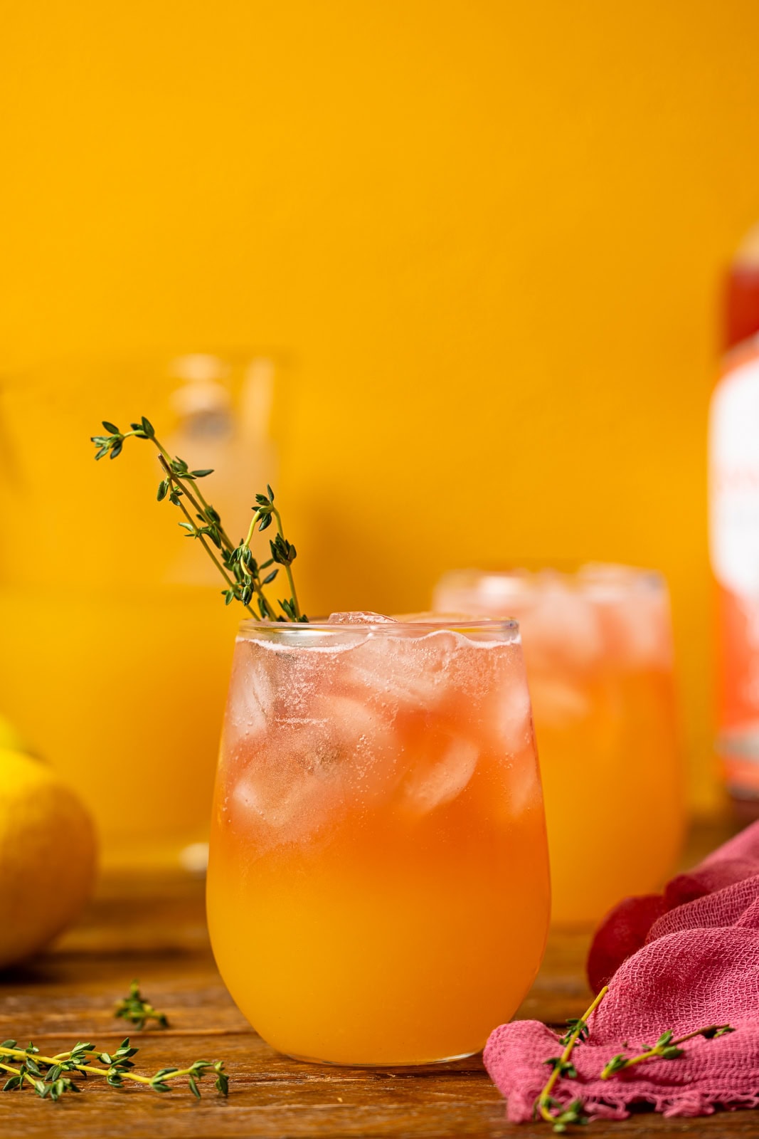 Two glasses of lemonade. 