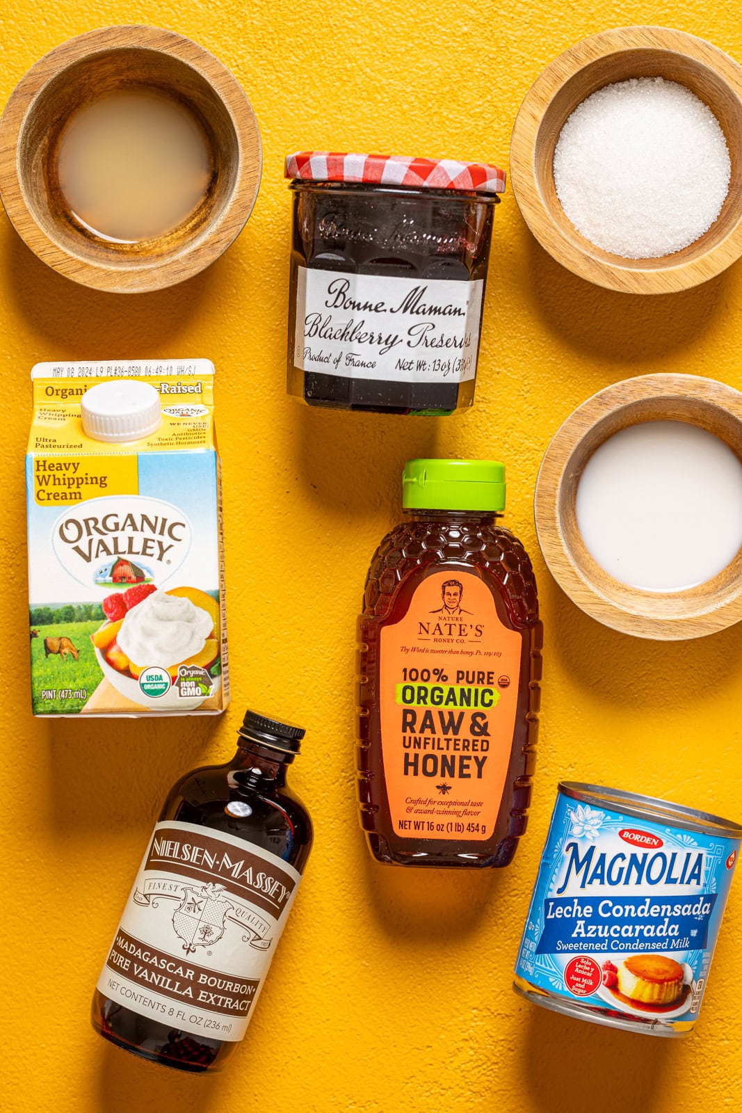 Ingredients on a yellow table.