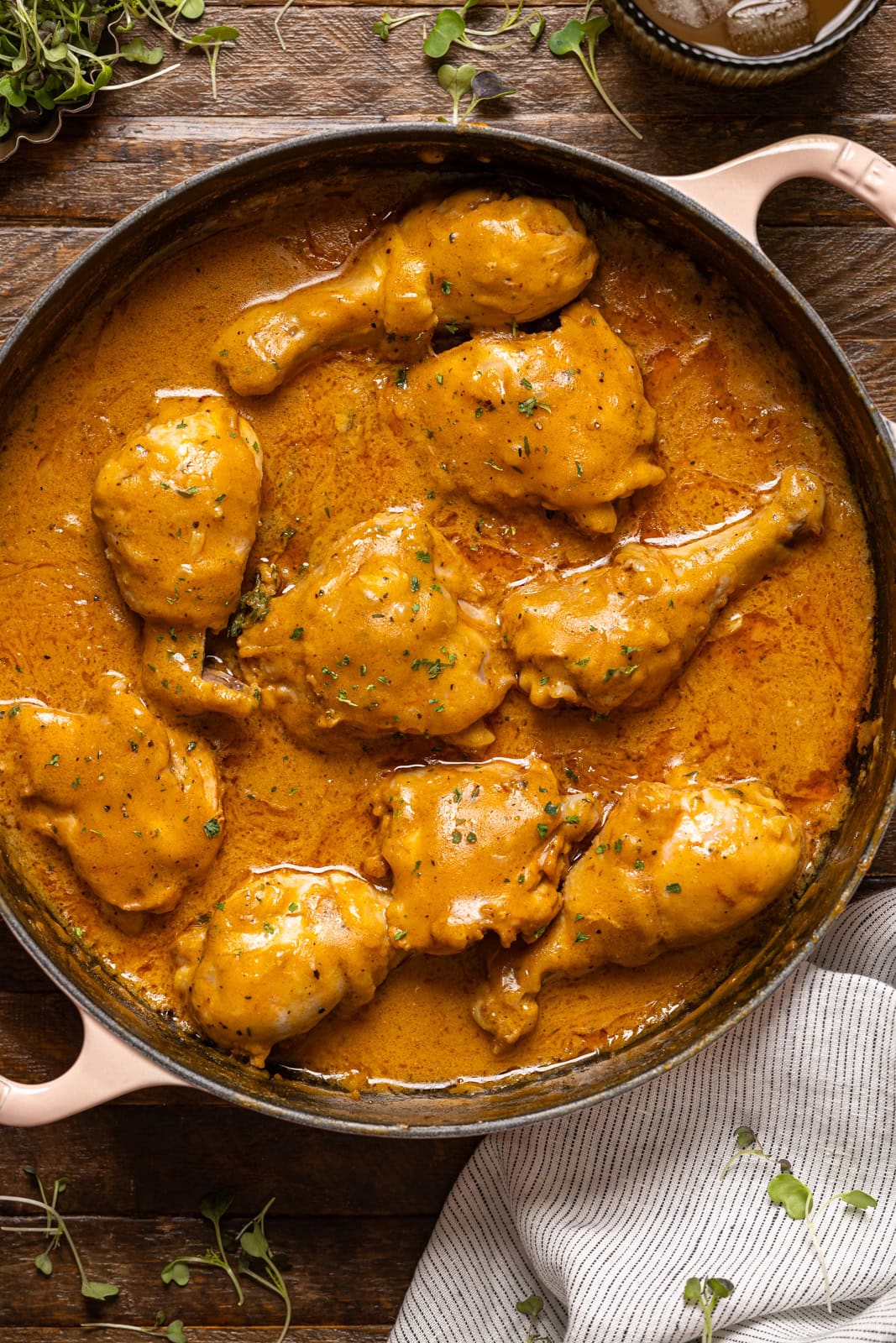 Up close shot of chicken in a white pot.