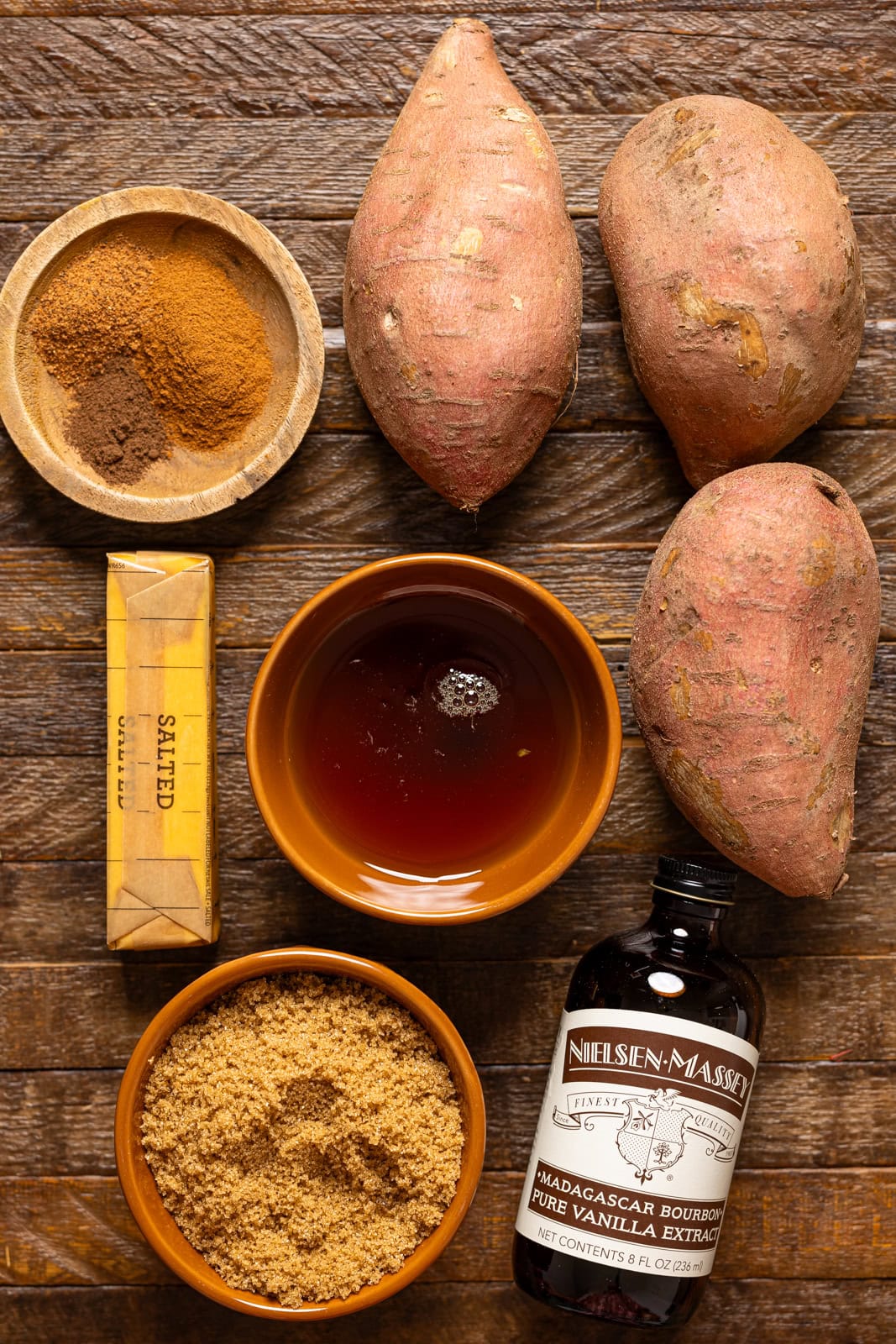 Ingredients on a brown wood table.