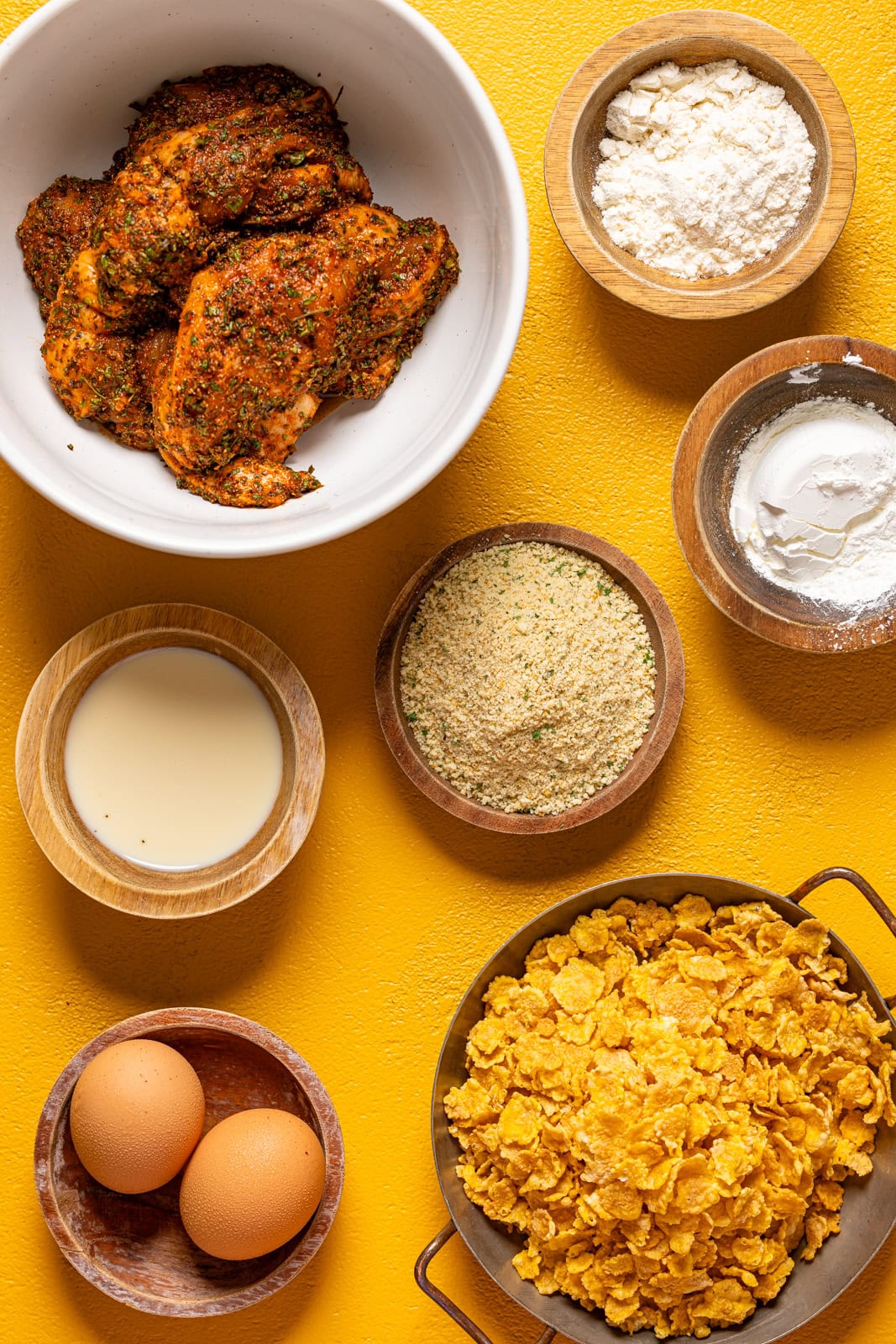 Ingredients on a yellow table.