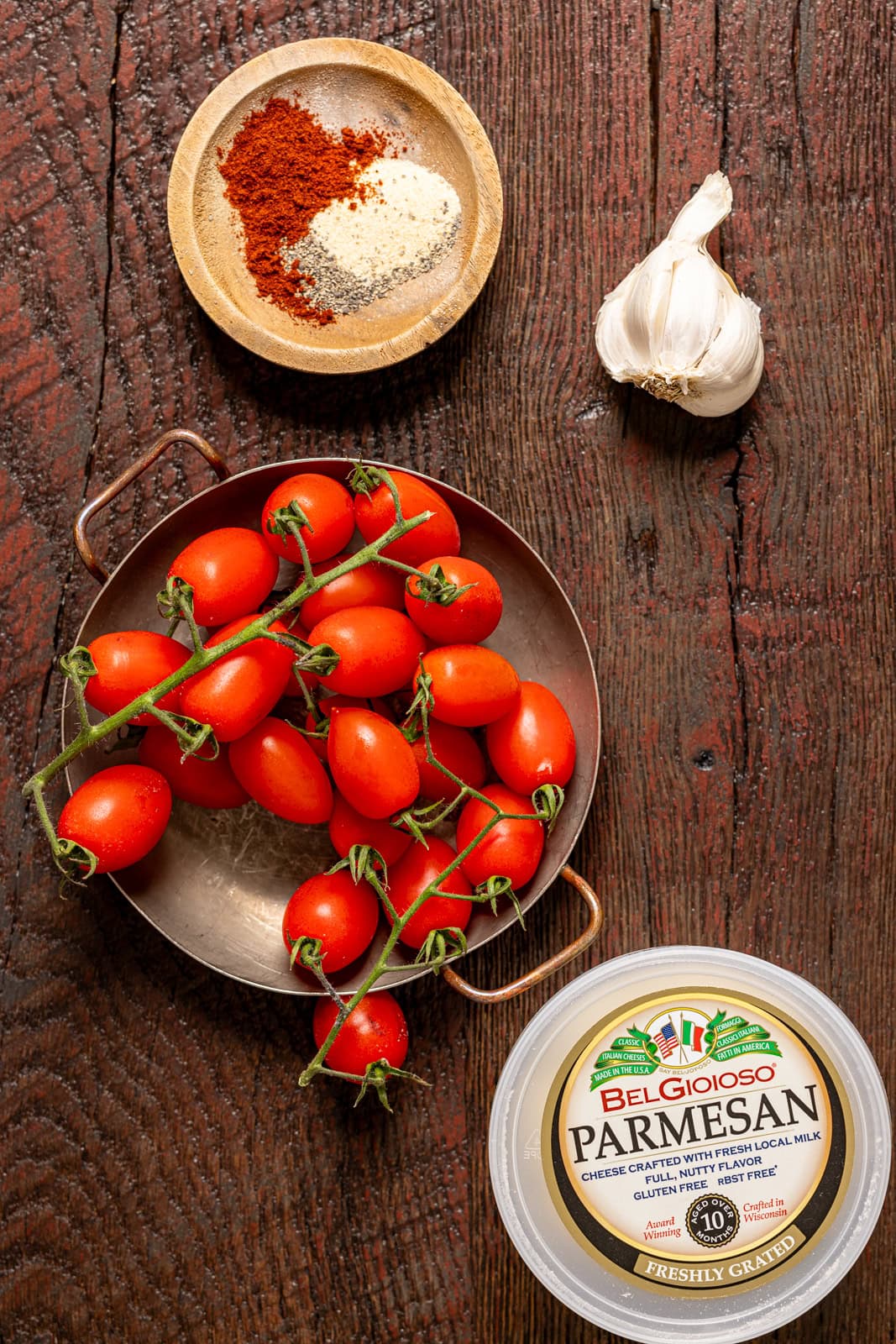 Ingredients on a burgundy wood table.