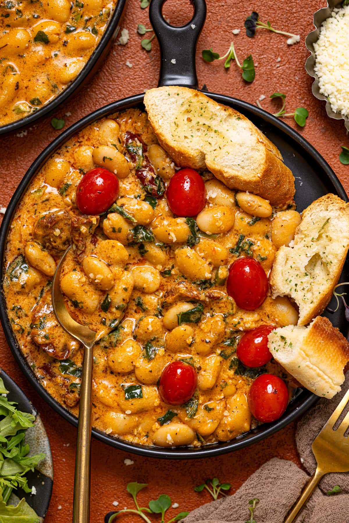 Up close shot of Marry Me beans for dinner with bread.