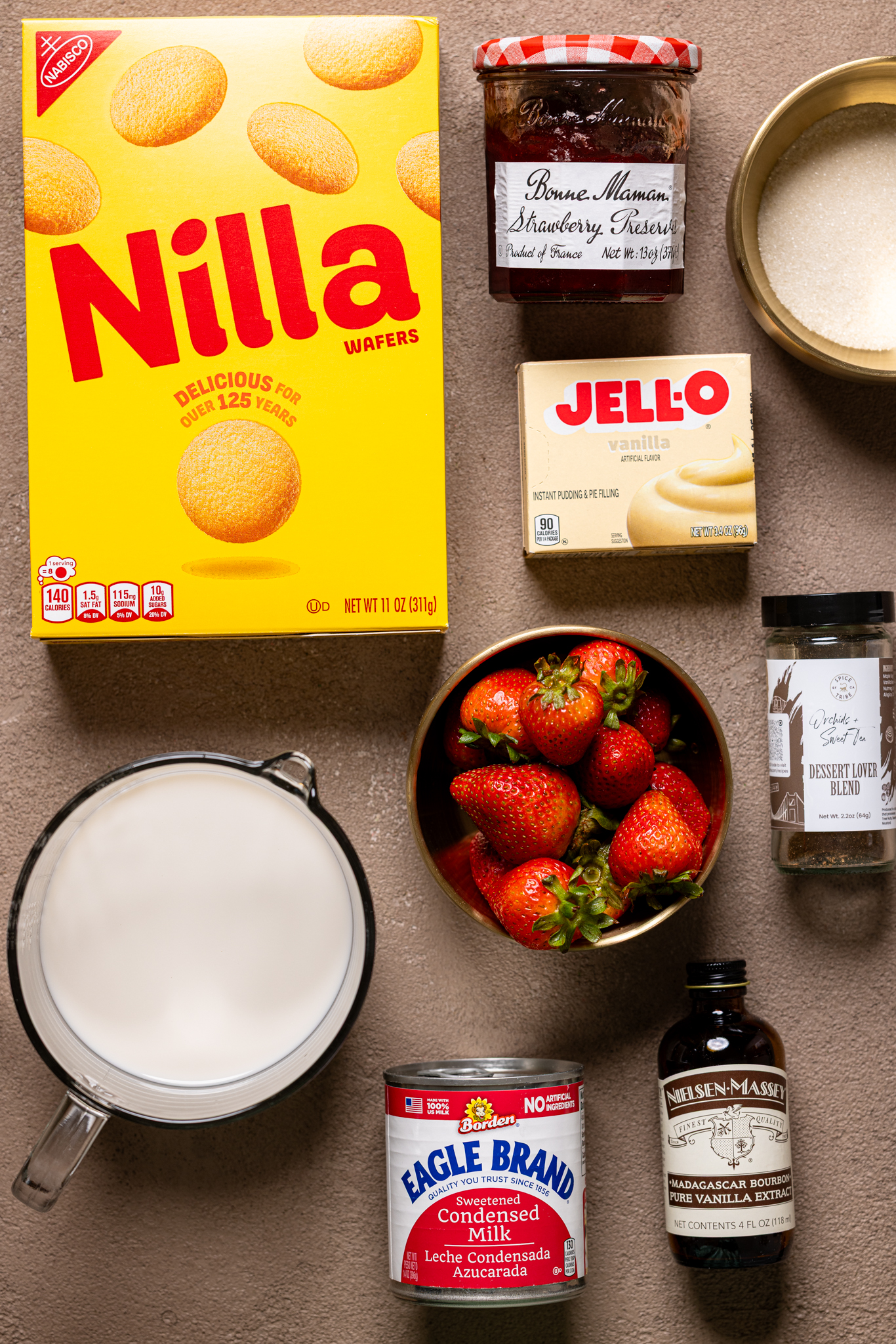 Ingredients on a brown-greyish table.