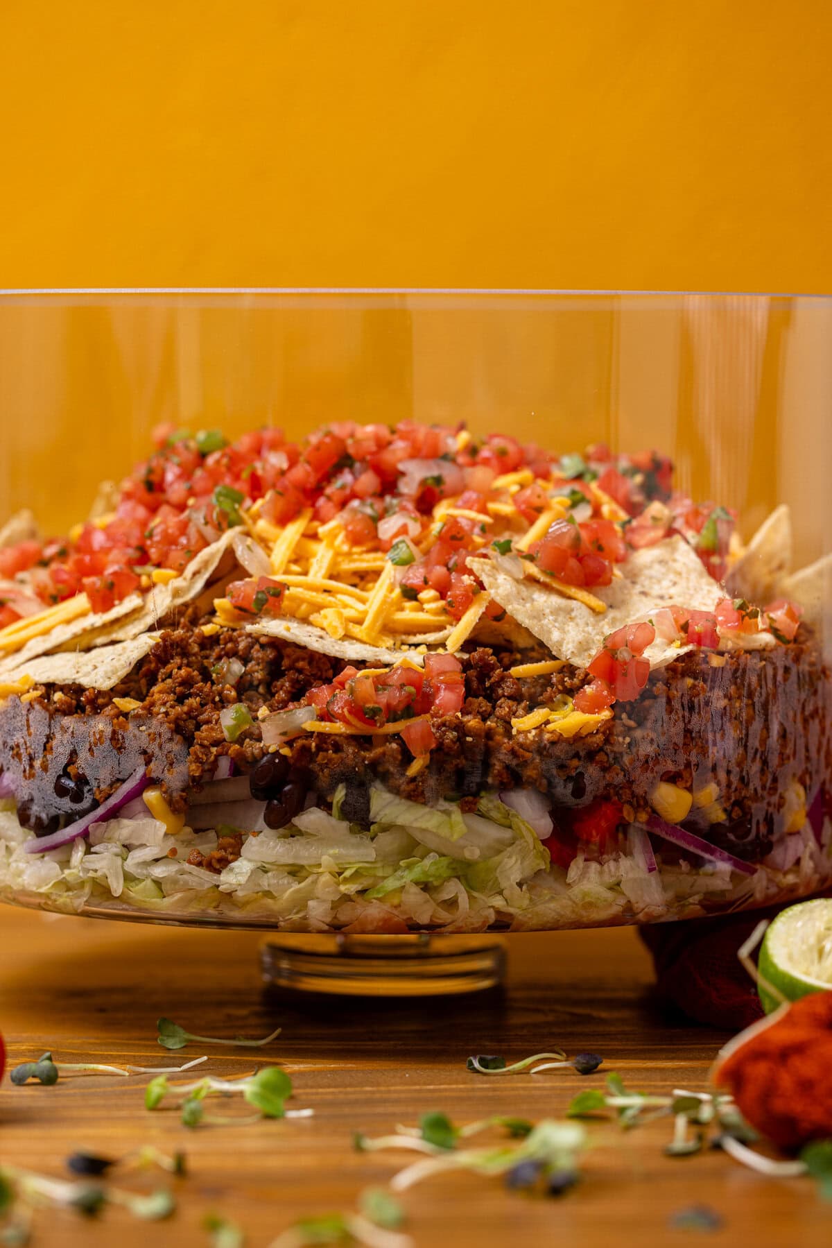 7-layer taco salad in a trifle bowl.