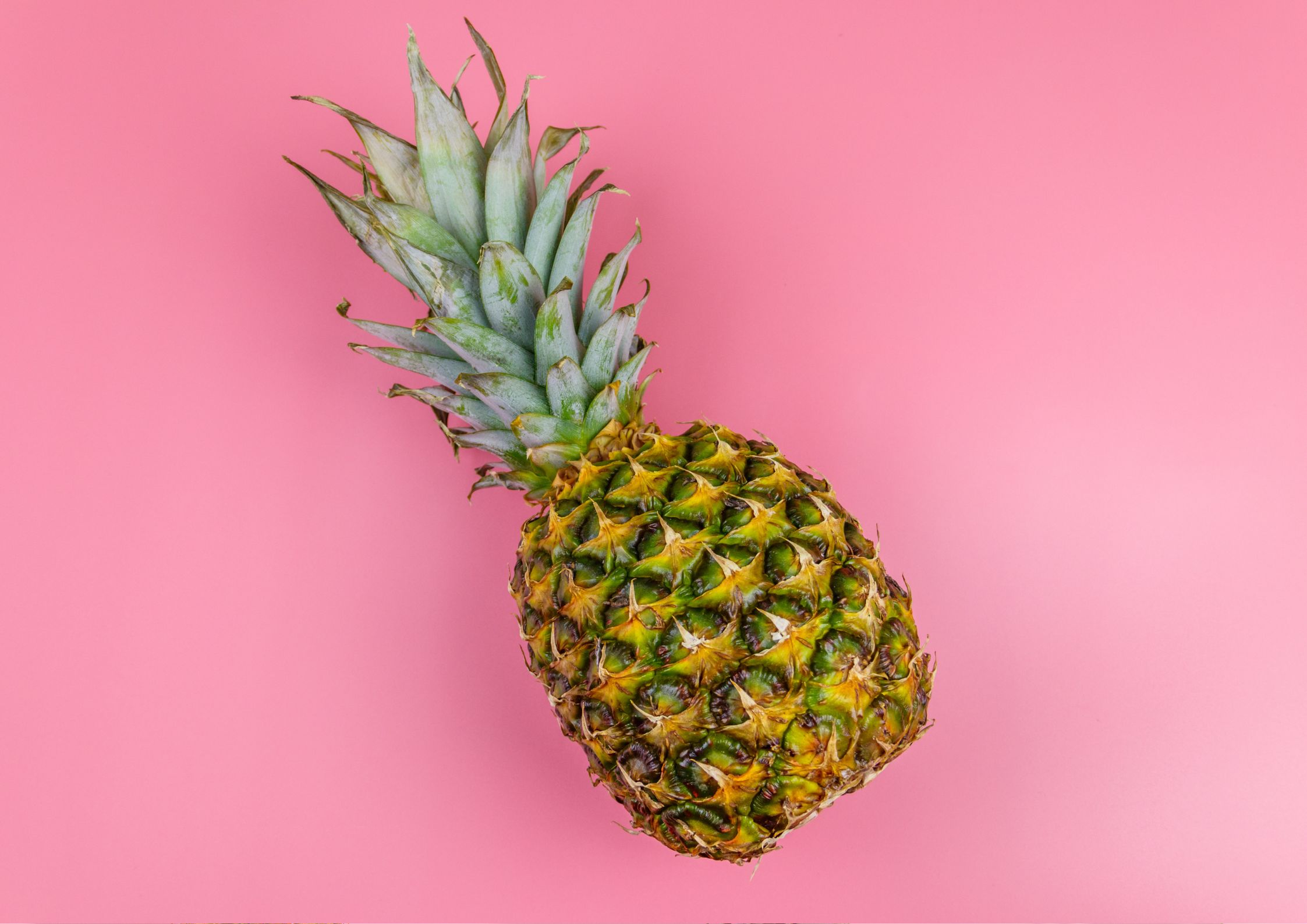 Pineapple on pink background