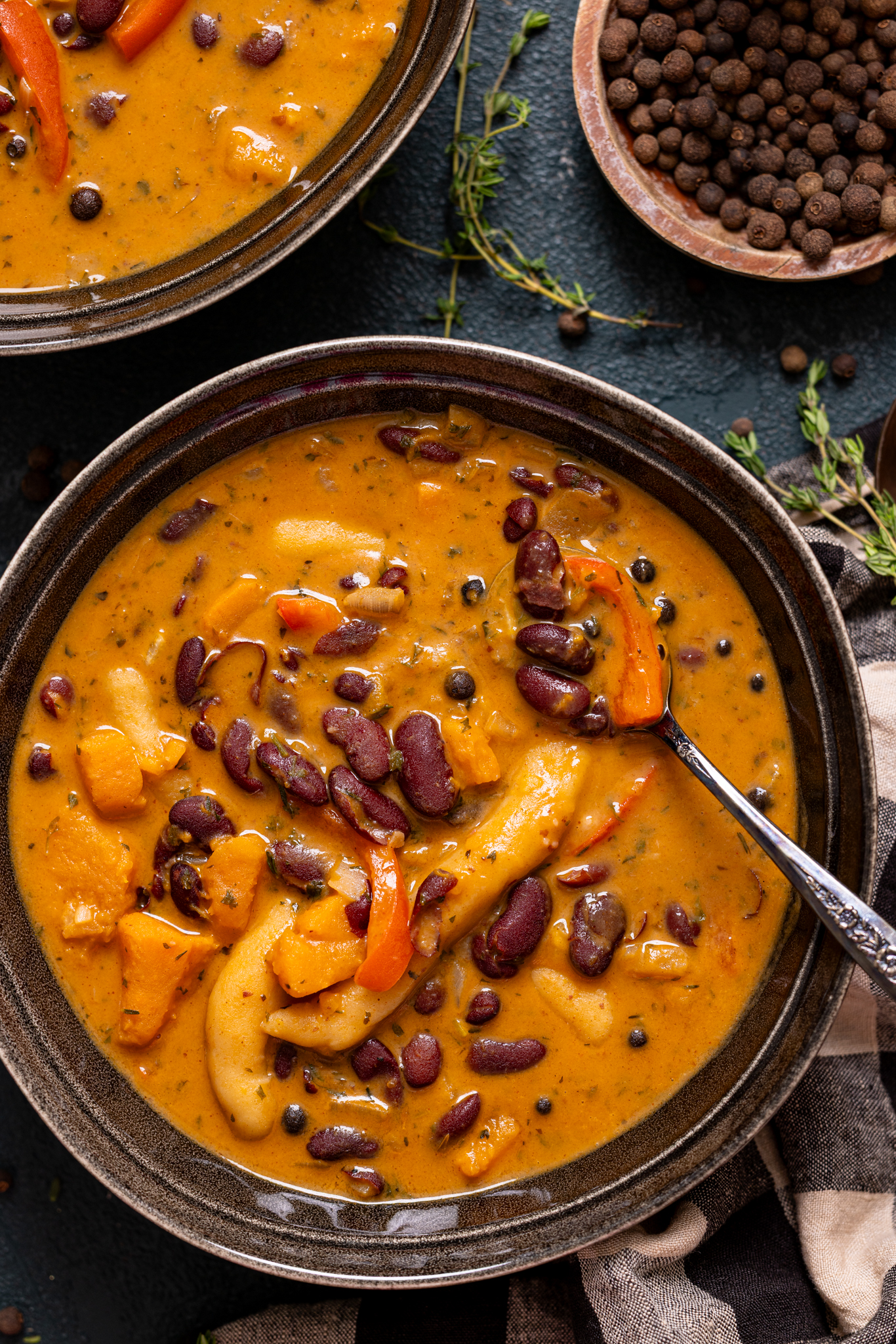 Up close shot of red peas soup in a bowl.