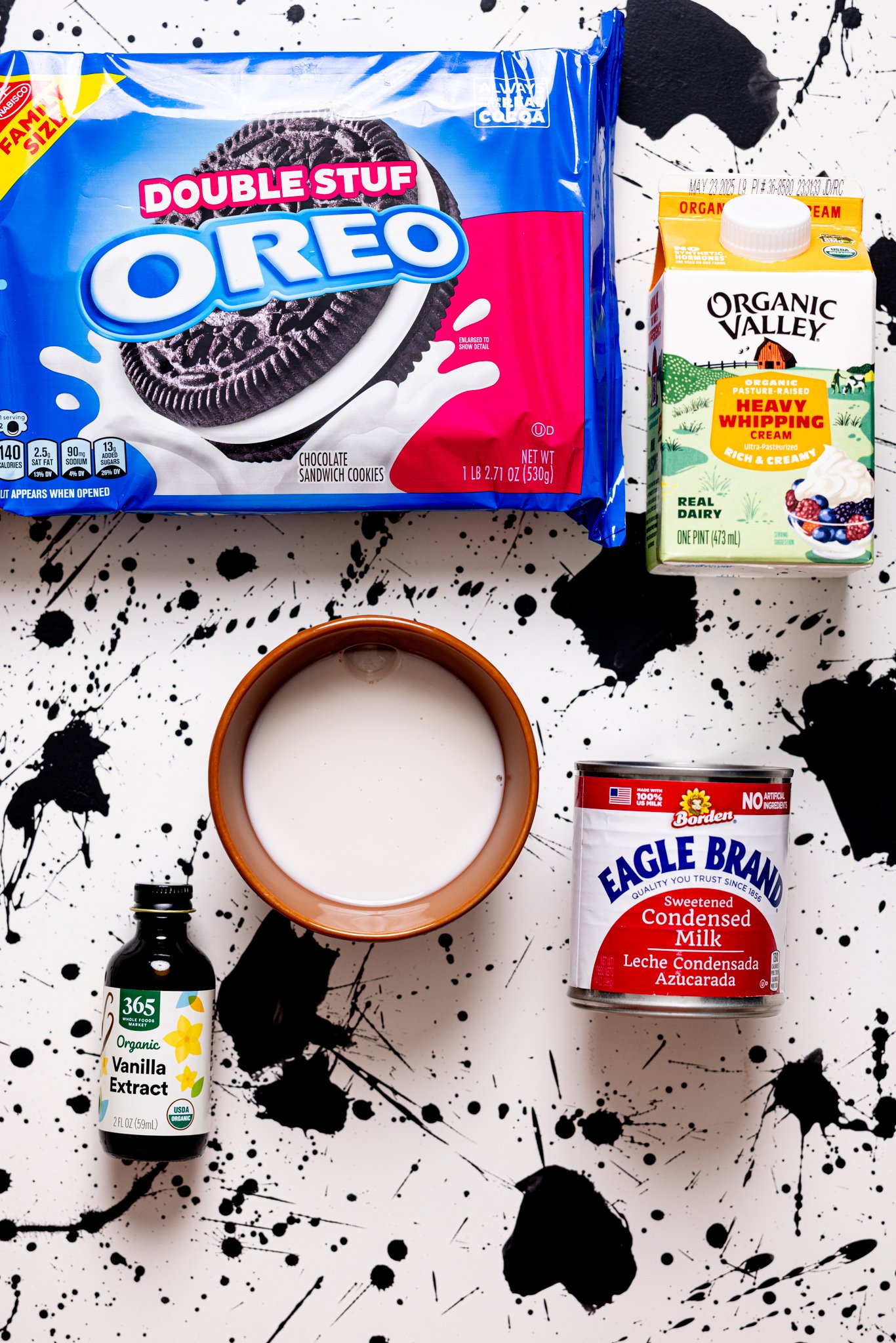 Ingredients on a black and white table.