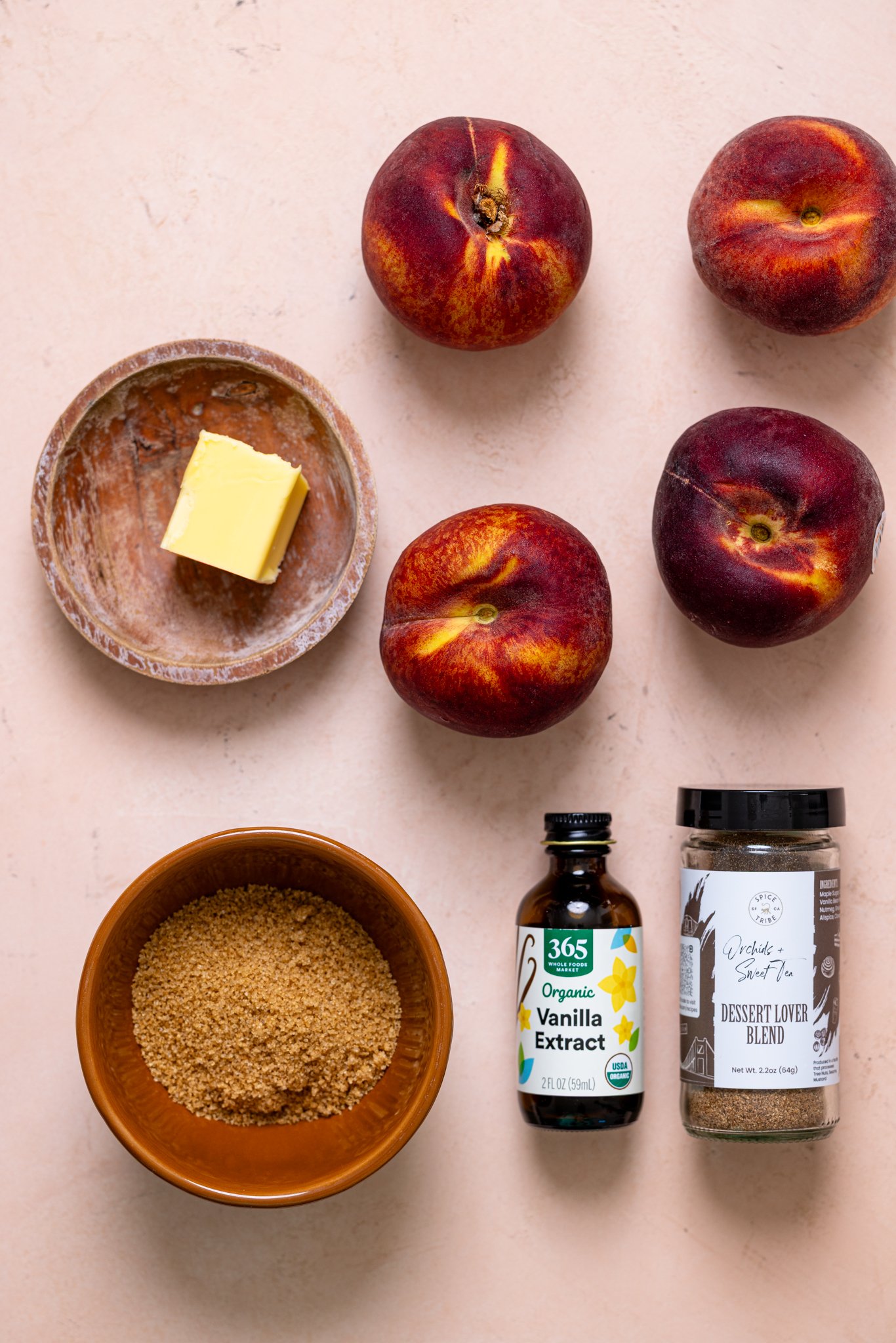 Ingredients on a peach table.