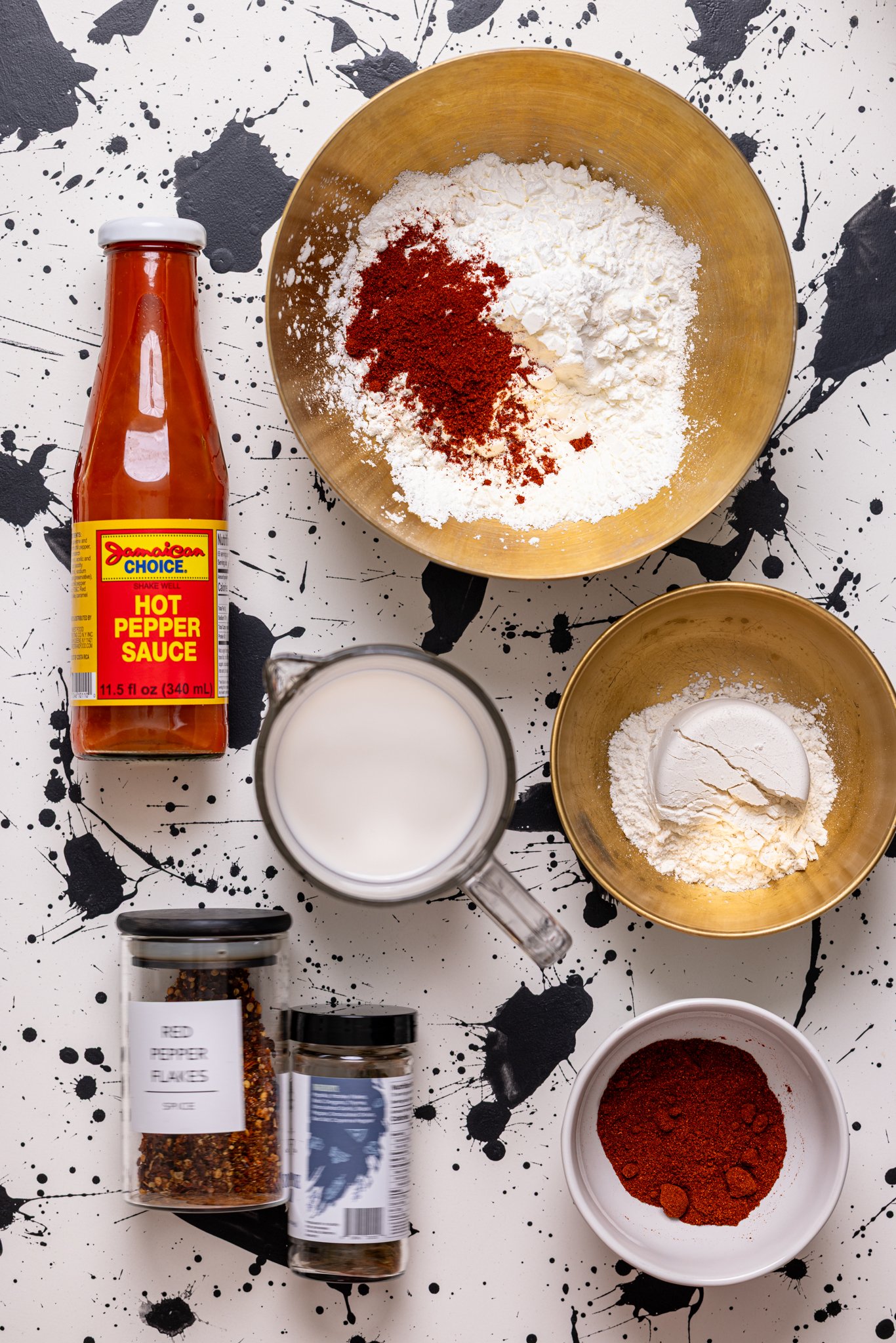 Ingredients on a black and white table.