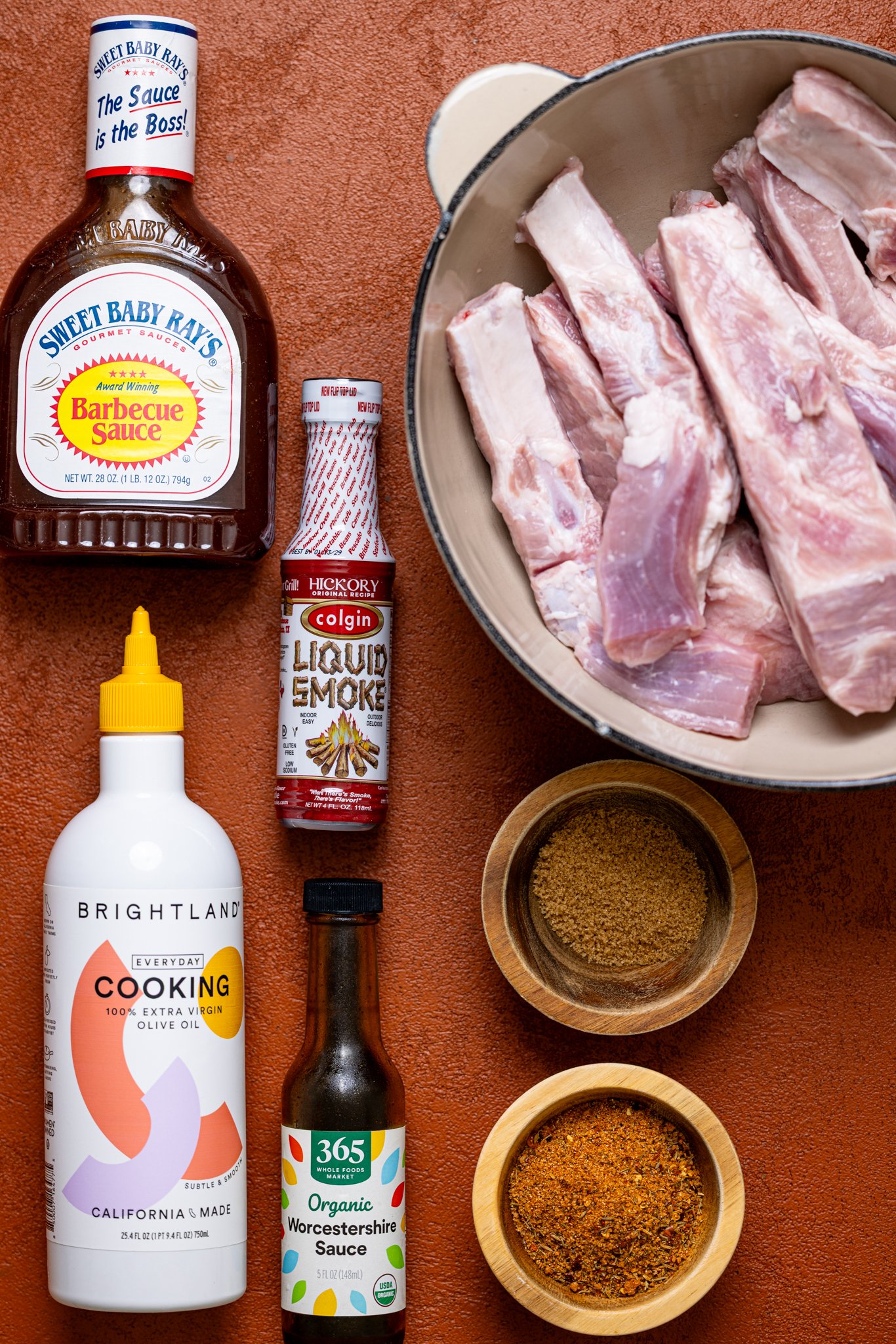 Ingredients on a burnt orange table.