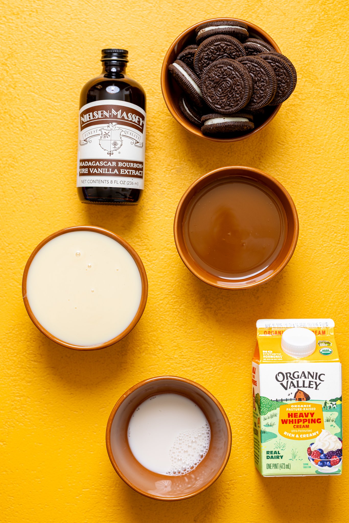 Ingredients on a yellow table.